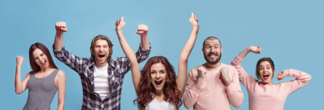 Winning success man happy ecstatic celebrating being a winner. Dynamic energetic image of male model
